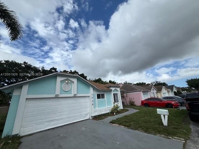 1034 W Jasmine Ln, North Lauderdale, FL 33068