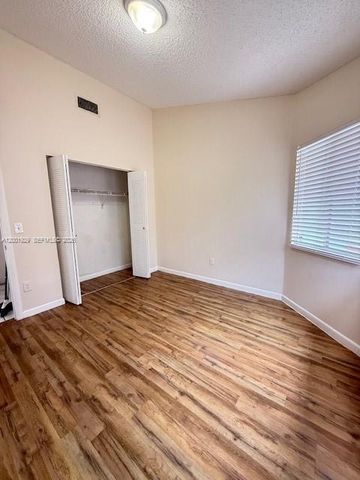 1034 W Jasmine Ln, North Lauderdale, FL 33068