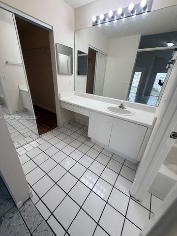 1034 W Jasmine Ln, North Lauderdale, FL 33068