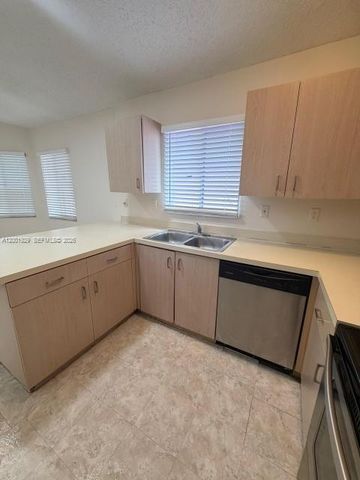 1034 W Jasmine Ln, North Lauderdale, FL 33068