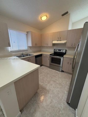 1034 W Jasmine Ln, North Lauderdale, FL 33068