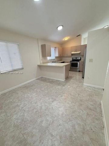 1034 W Jasmine Ln, North Lauderdale, FL 33068