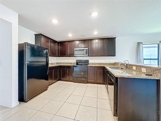 1899 AMBER SWEET CIRCLE, Dundee, FL 33838