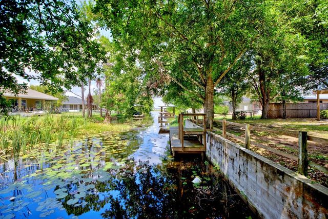 100 HONEYSUCKLE LN, Lake Placid, FL 33852