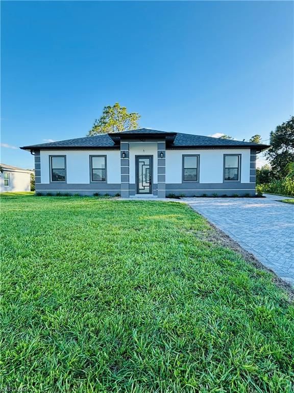 563 Oakshire LN, LEHIGH ACRES, FL 33972 — photo 3