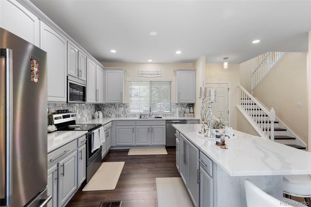 608 Hayloft Way, Brighton, CO 80601