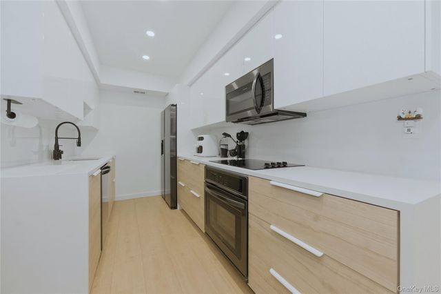 81 Alhambra Drive, Oceanside, NY 11572