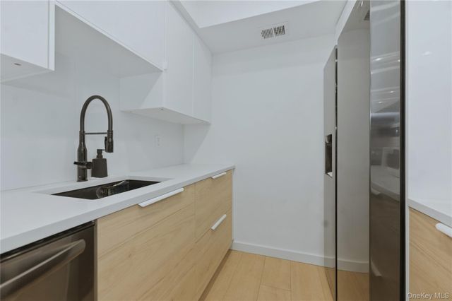 81 Alhambra Drive, Oceanside, NY 11572