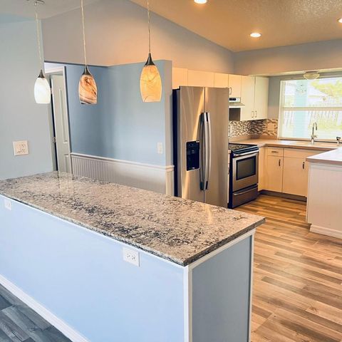 1150 SW Haleyberry Avenue, Port St. Lucie, FL 34953