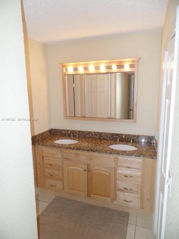 280 Racquet Club Road 102, Weston, FL 33326