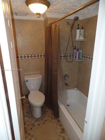 280 Racquet Club Road 102, Weston, FL 33326