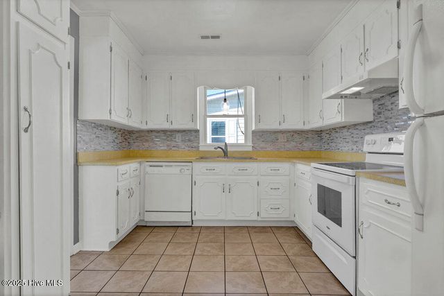 1207 N Topsail Drive, Surf City, NC 28445