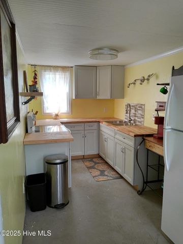 1207 N Topsail Drive, Surf City, NC 28445