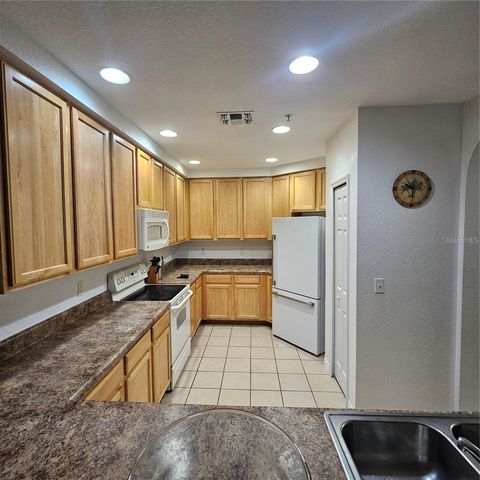 9055 TREASURE TROVE LANE 201, Kissimmee, FL 34747