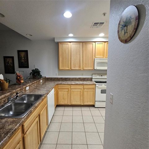 9055 TREASURE TROVE LANE 201, Kissimmee, FL 34747