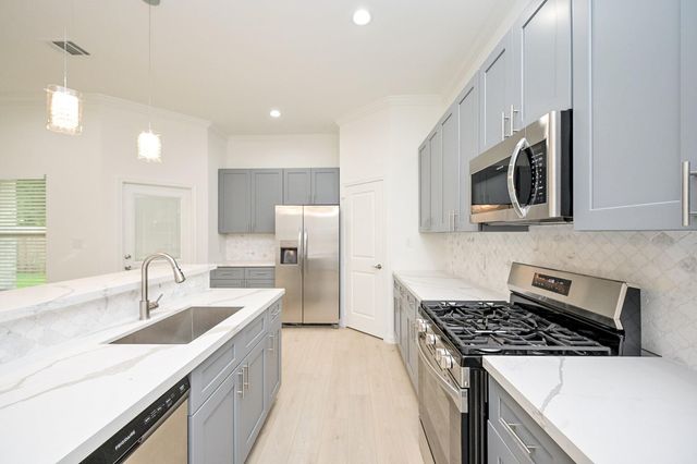 9710 Champion Heavens Drive, Spring, TX 77379