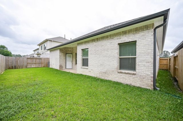 9710 Champion Heavens Drive, Spring, TX 77379