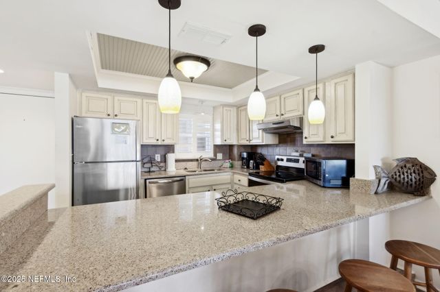 3350 S FLETCHER Avenue S E3, Fernandina Beach, FL 32034