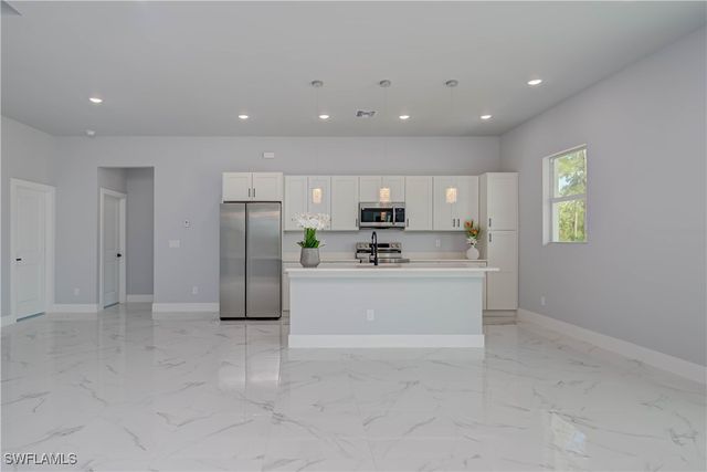 1104 E 11th ST, Lehigh Acres, FL 33972