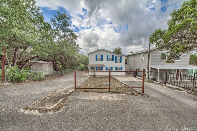 1108 Pebble Beach Dr NW, Lakehills, TX 78063