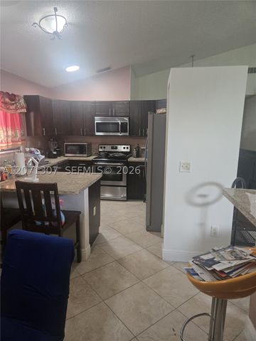 818 E Palm Run Dr, North Lauderdale, FL 33068