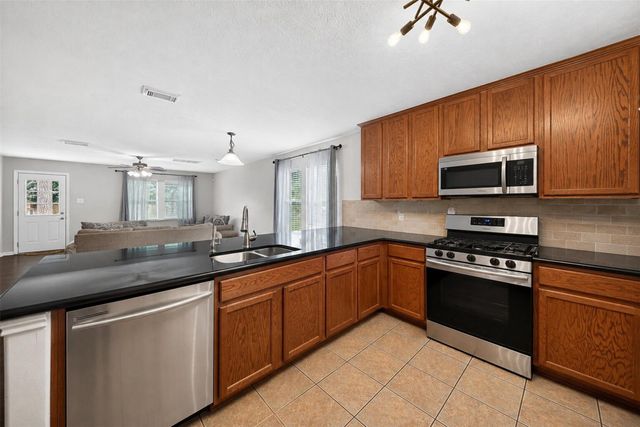 9130 Rolling Rapids Road, Humble, TX 77346