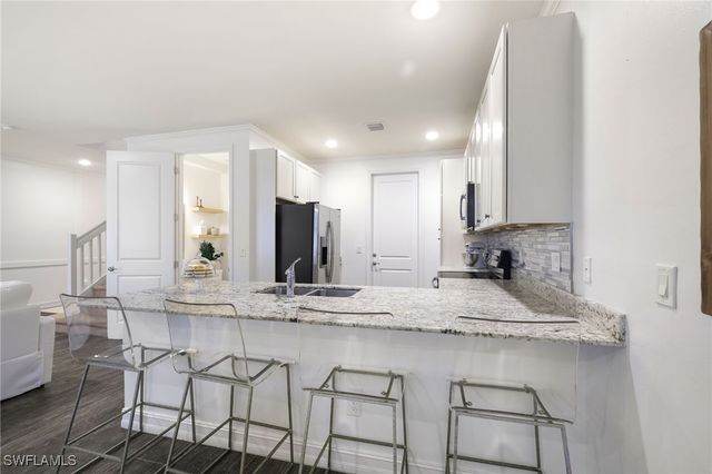7887 Bristol CIR, Naples, FL 34120