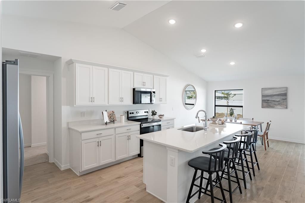 Image 6 of property listing at 1714 NE 13th PL, Cape Coral, FL 33909