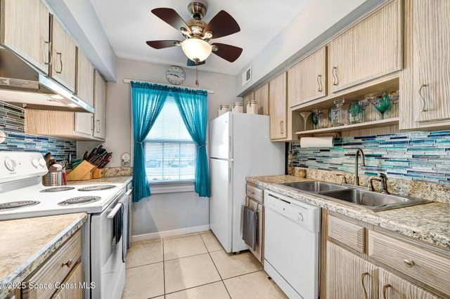 152 E East Colonial Court Court 84, Indian Harbour Beach, FL 32937