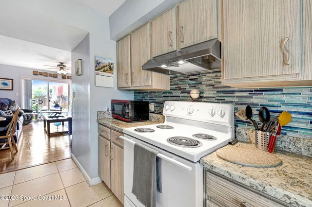 152 E East Colonial Court Court 84, Indian Harbour Beach, FL 32937