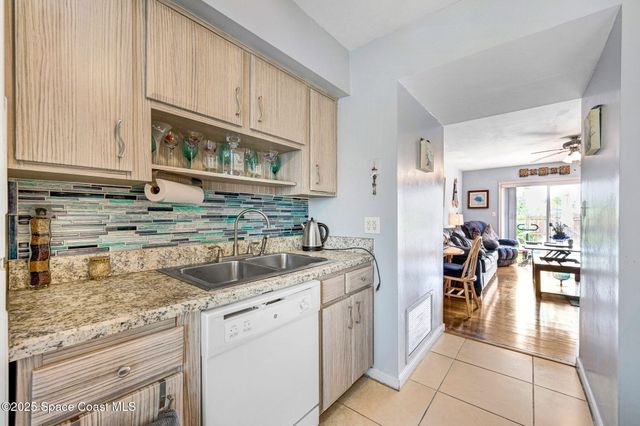 152 E East Colonial Court Court 84, Indian Harbour Beach, FL 32937