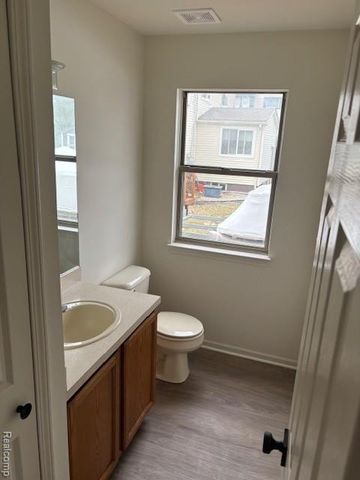 210 Rosebud Street, Walled Lake, MI 48390