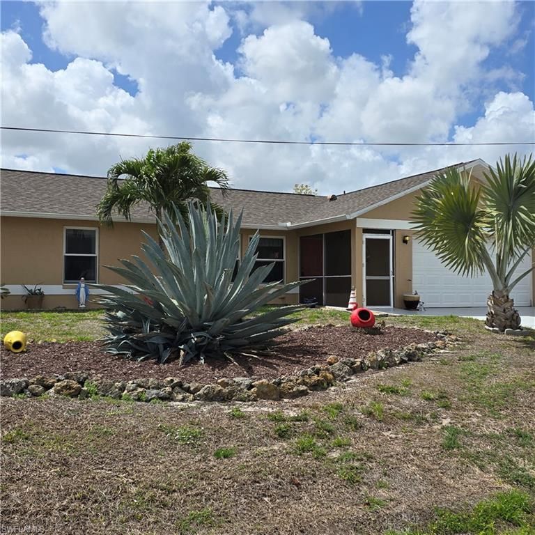 308 NW 20th TER, CAPE CORAL, FL 33993 — exterior