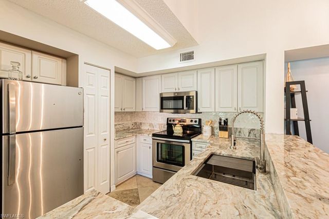 1230 Wildwood Lakes BLVD 202, Naples, FL 34104