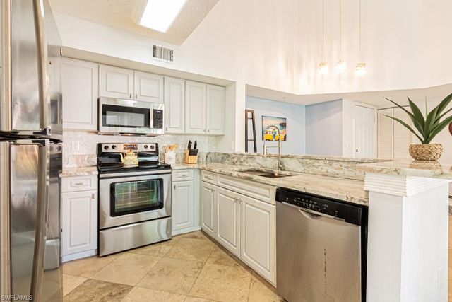 1230 Wildwood Lakes BLVD 202, Naples, FL 34104