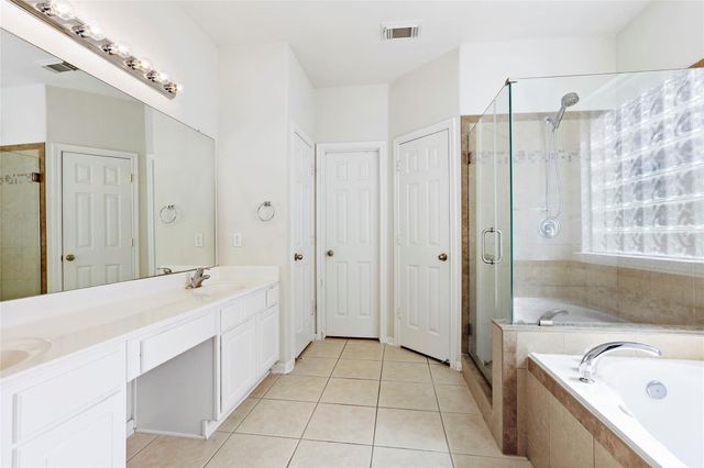 27 Harmony Hollow Court, The Woodlands, TX 77385