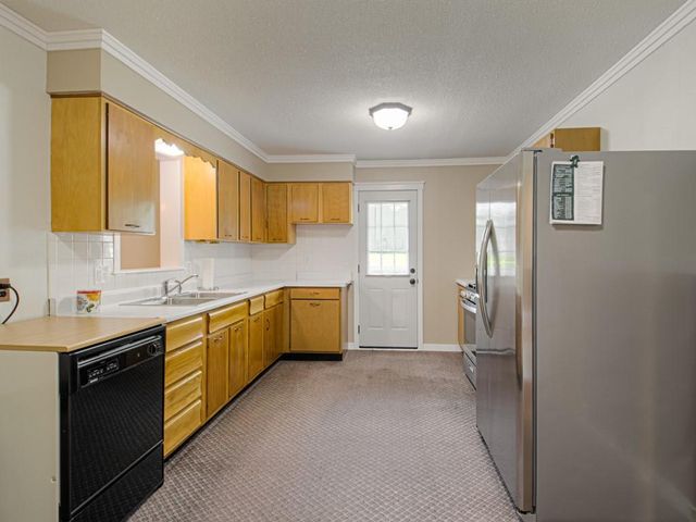 2213 N Mcbride Avenue, Sugar Creek, MO 64050
