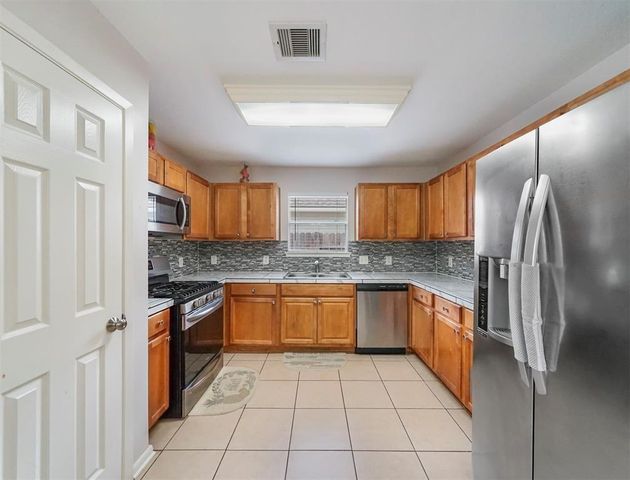 6619 Wellington Meadows Drive, Katy, TX 77449