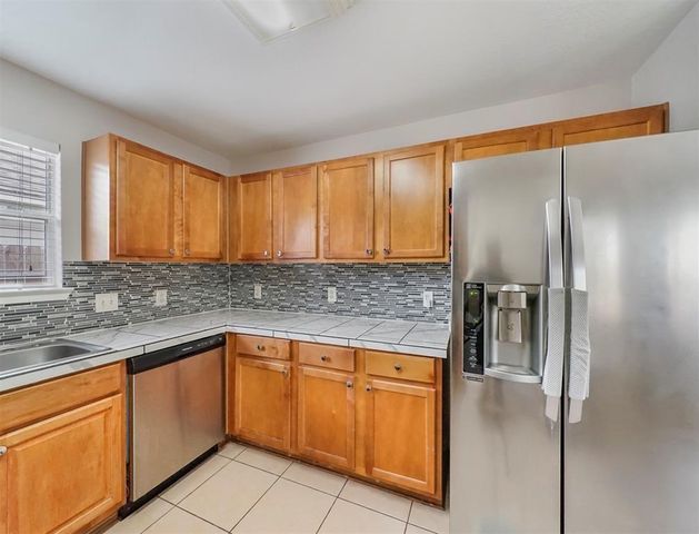 6619 Wellington Meadows Drive, Katy, TX 77449