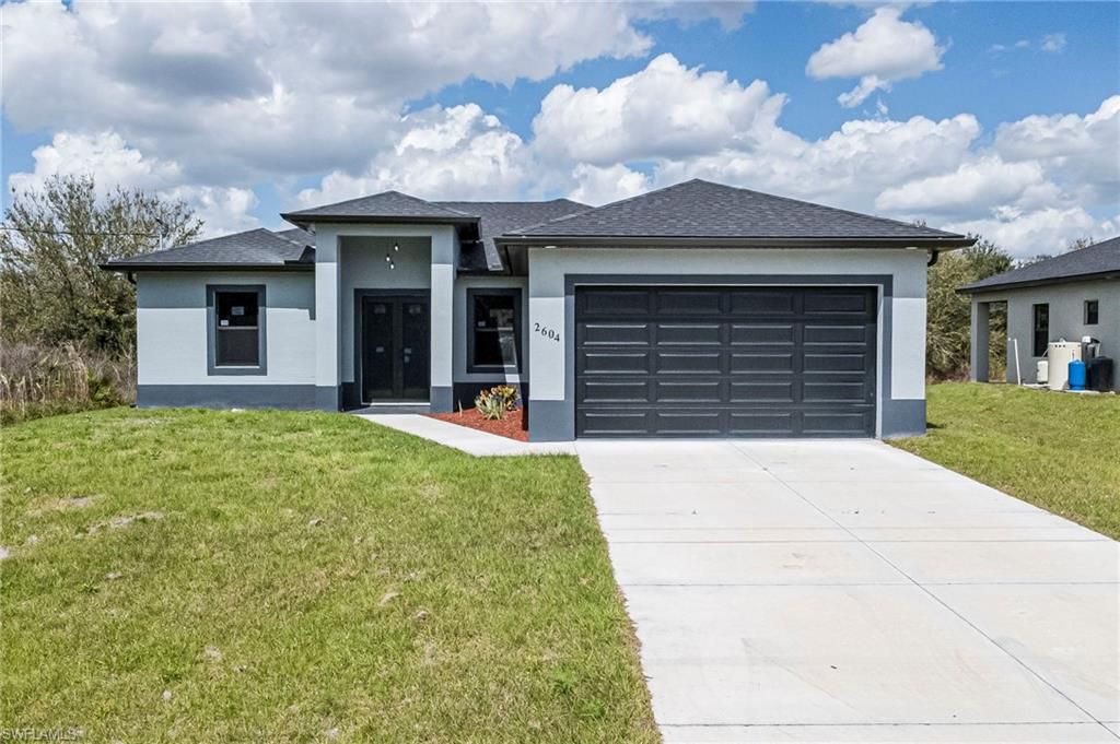 2604 73rd ST W, LEHIGH ACRES, FL 33971 — exterior