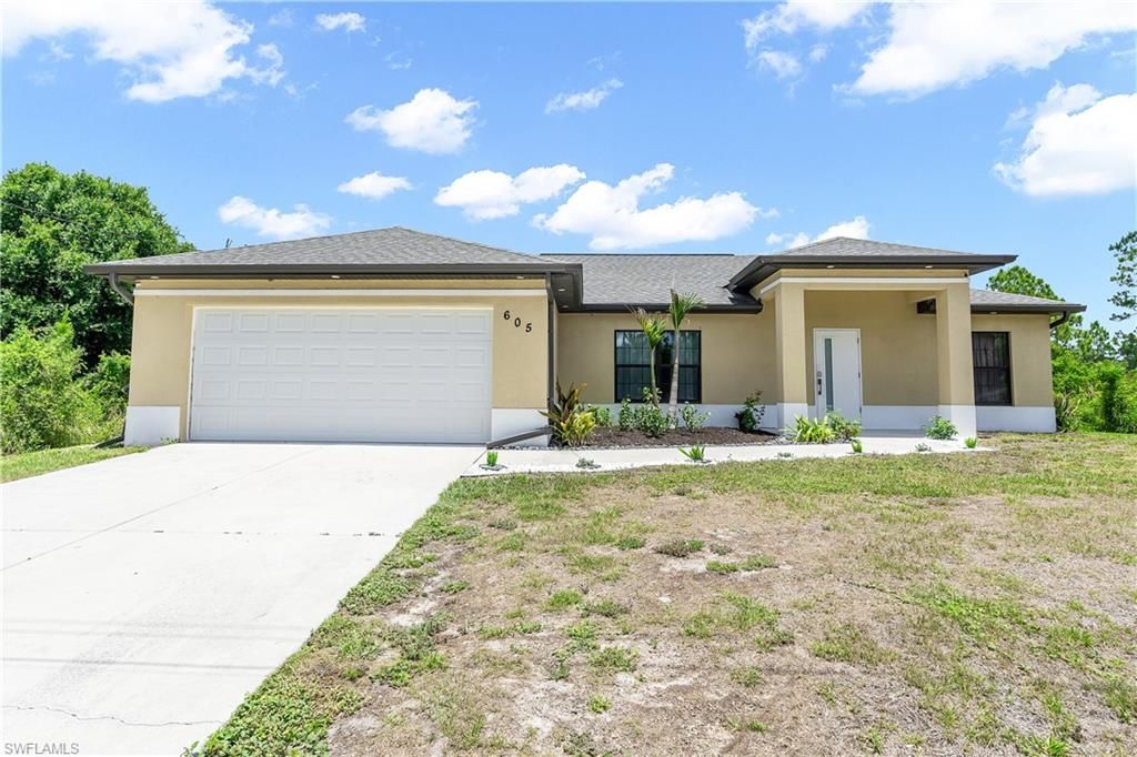 605 11th ST, LEHIGH ACRES, FL 33972 — photo 3