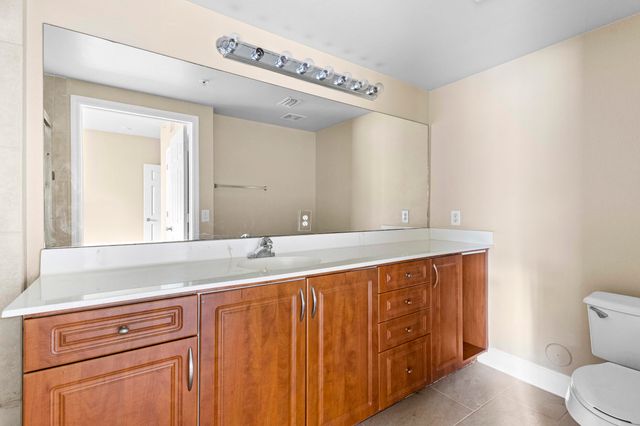 6434 EMERALD DUNES Drive 104, West Palm Beach, FL 33411