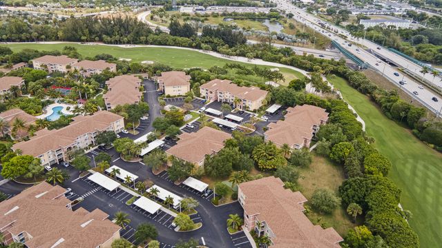 6434 EMERALD DUNES Drive 104, West Palm Beach, FL 33411