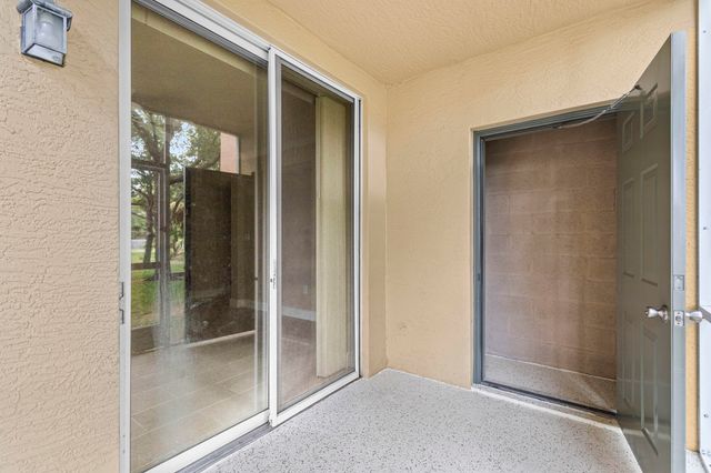 6434 EMERALD DUNES Drive 104, West Palm Beach, FL 33411