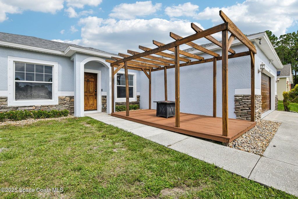 Image 1 of property listing at 982 Colonial Avenue SE, Palm Bay, FL 32909
