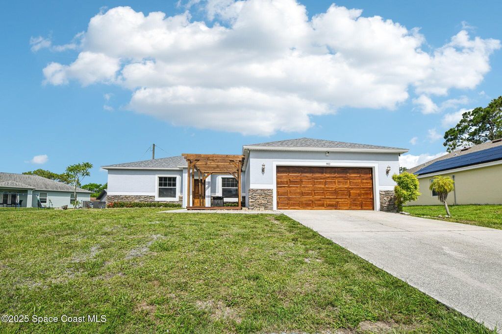 Image 2 of property listing at 982 Colonial Avenue SE, Palm Bay, FL 32909