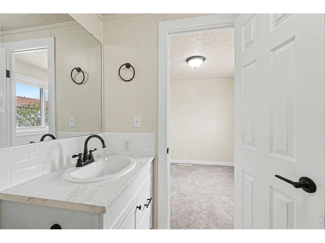 1204 MacJames Ct, Dacono, CO 80514