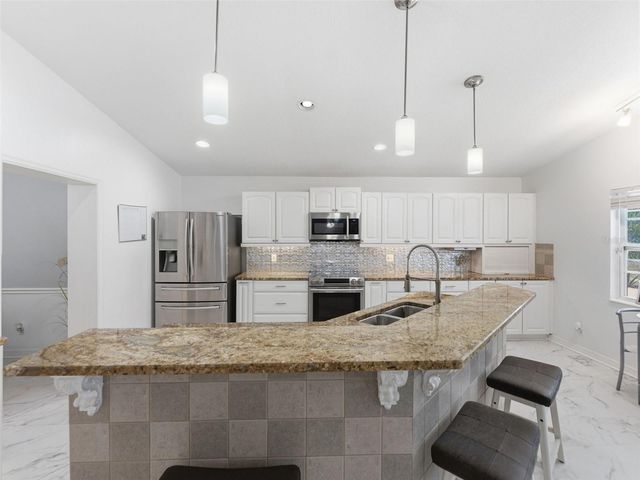 6640 WINDING OAK DRIVE, Tampa, FL 33625