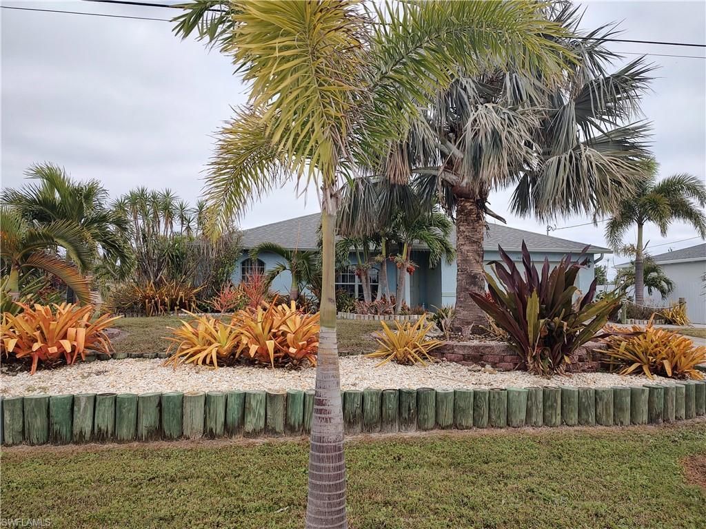 1409 NW 9th TER, CAPE CORAL, FL 33993 — exterior