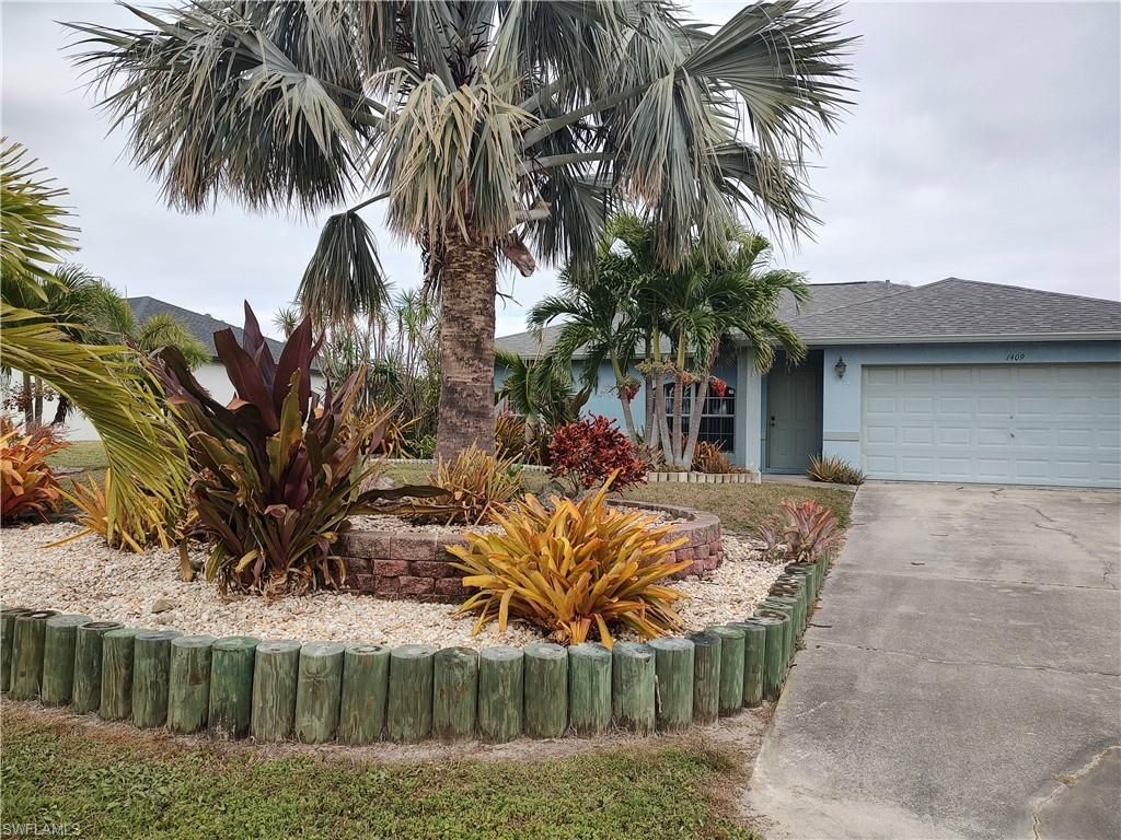 1409 NW 9th TER, CAPE CORAL, FL 33993 — photo 2